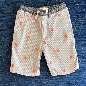 Mini Boden nautical Striped Shorts with fluorescent orange skull & crossbones
